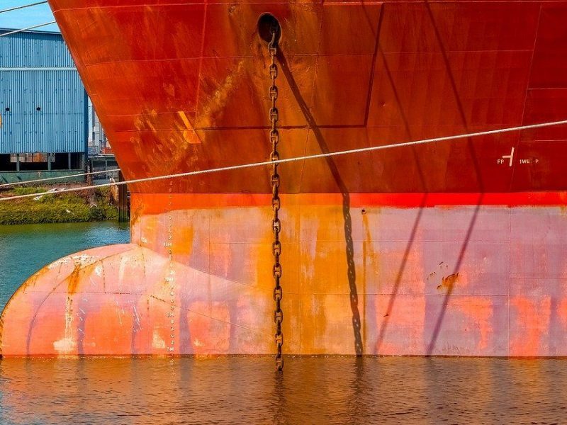 The hull of a ship in the water