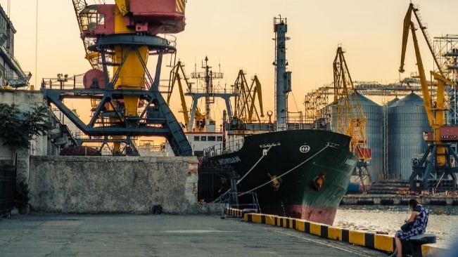 A ship anchored at a shipyard for maintenance 